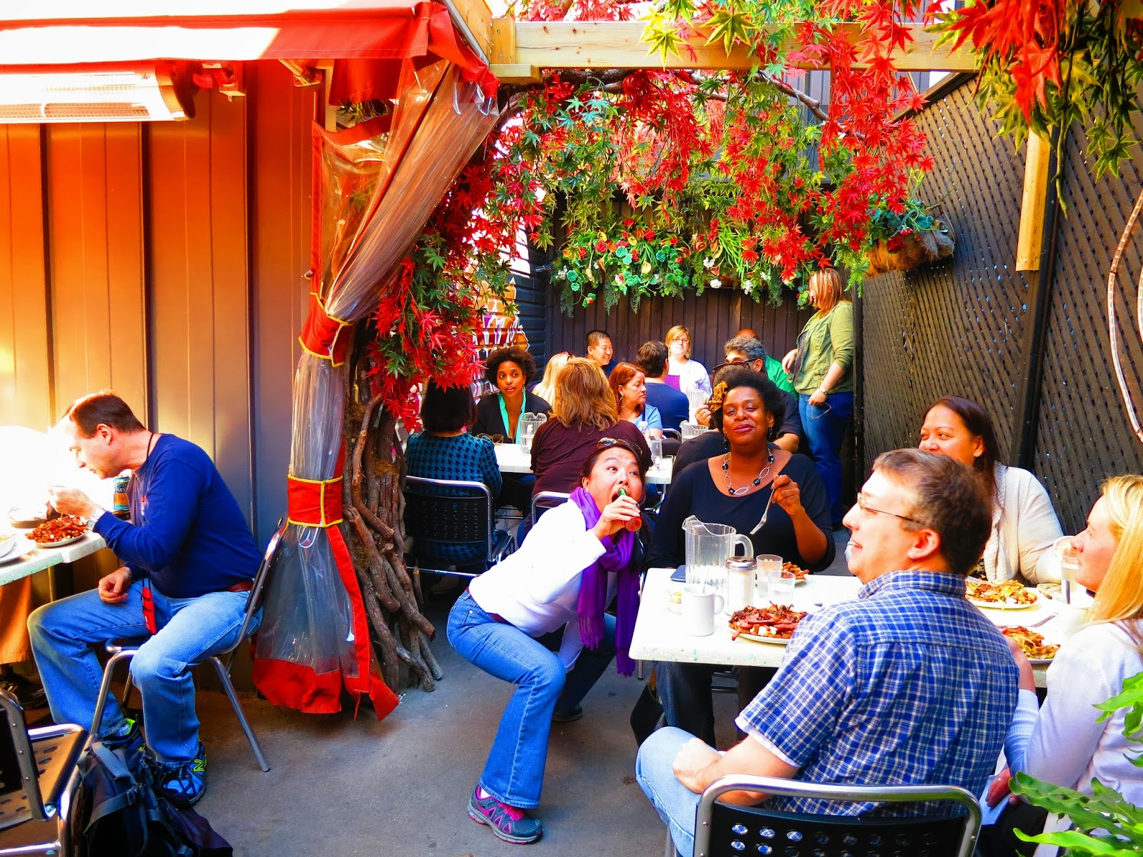 people enjoying poutine on terasse