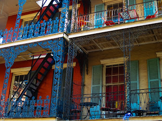 Beautiful, colorful wrought iron balconies in the French Quarter of NOLA