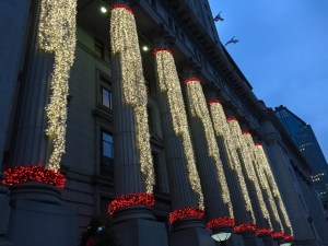 Christmas lights drape columns