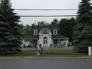 Bicycle in front of white town hall